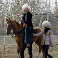 Sometimes you've gotta get up on that horse! Beautiful day in Turkmenistan!
